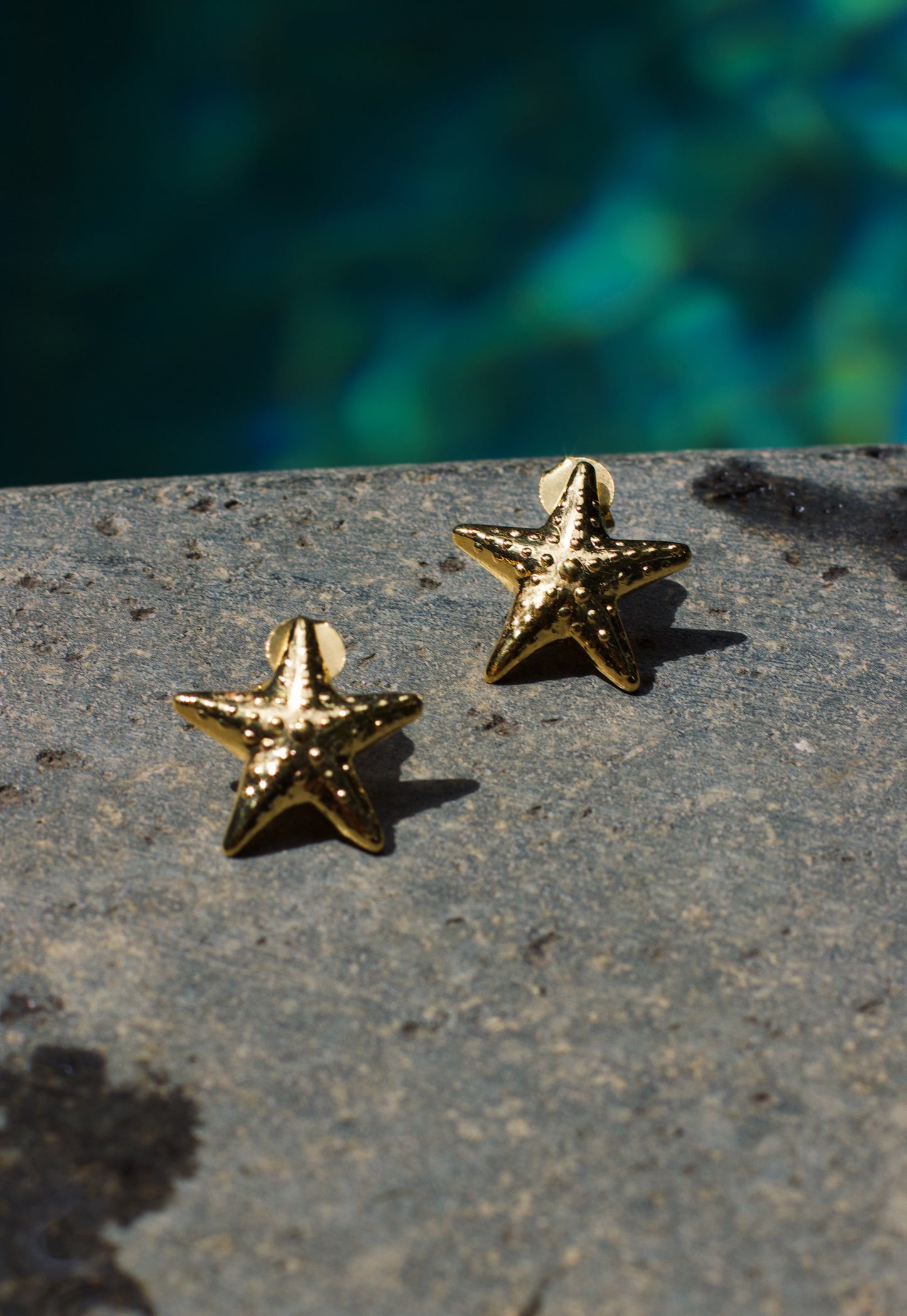 Front Perspective of Gold Starfish Stud Earrings Lifestyle Shot